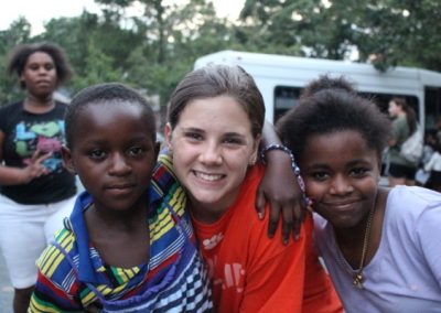 A group of children posing for the camera.