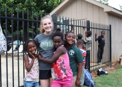 A group of children standing next to each other.